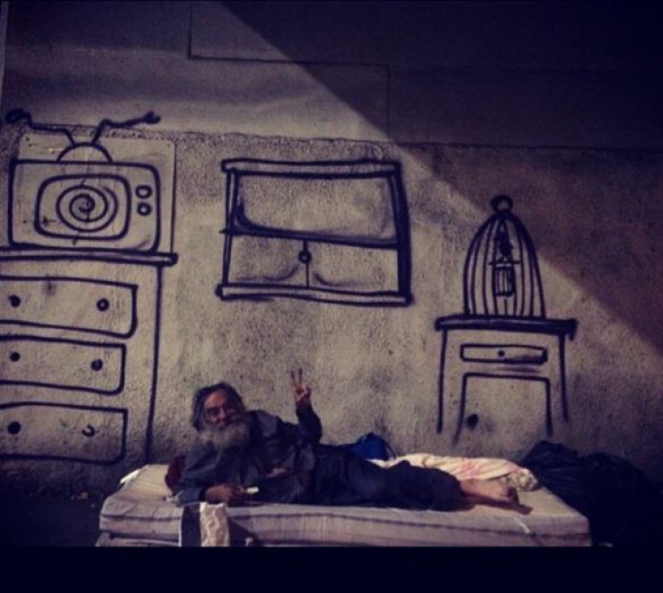 Un muro per dipingere i sogni: la street art dalla parte dei clochard