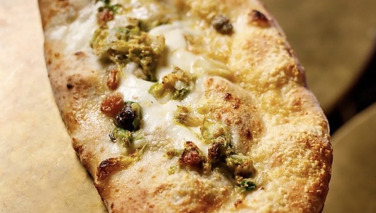 Nelle pizze di Dry Milano c'è un mondo da scoprire. Anche nel bicchiere