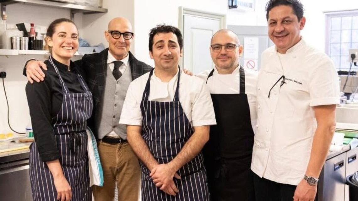 Francesco Mazzei con il suo staff e Stanley Tucci