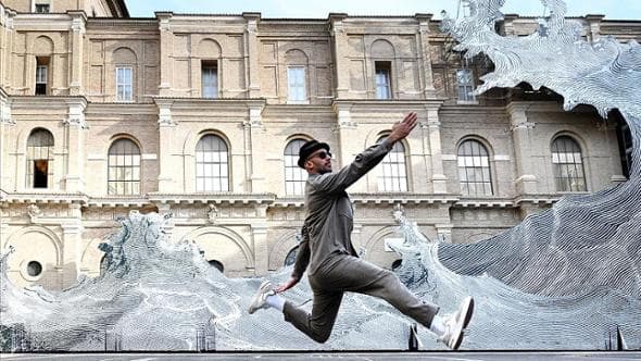 Artist JR: “After us, the flood. That’s why my wave is sweeping across the Vatican”