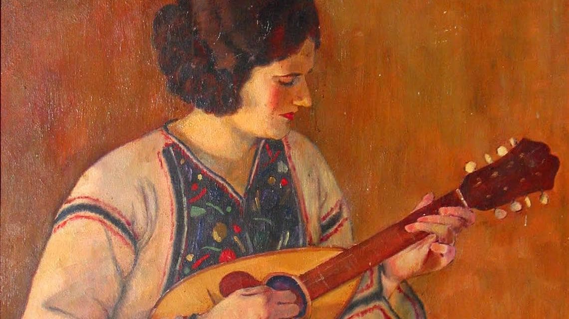 Suonatrice di Mandolino (foto di Alfonso Napolitano - Archivio Museo Nori De' Nobili)