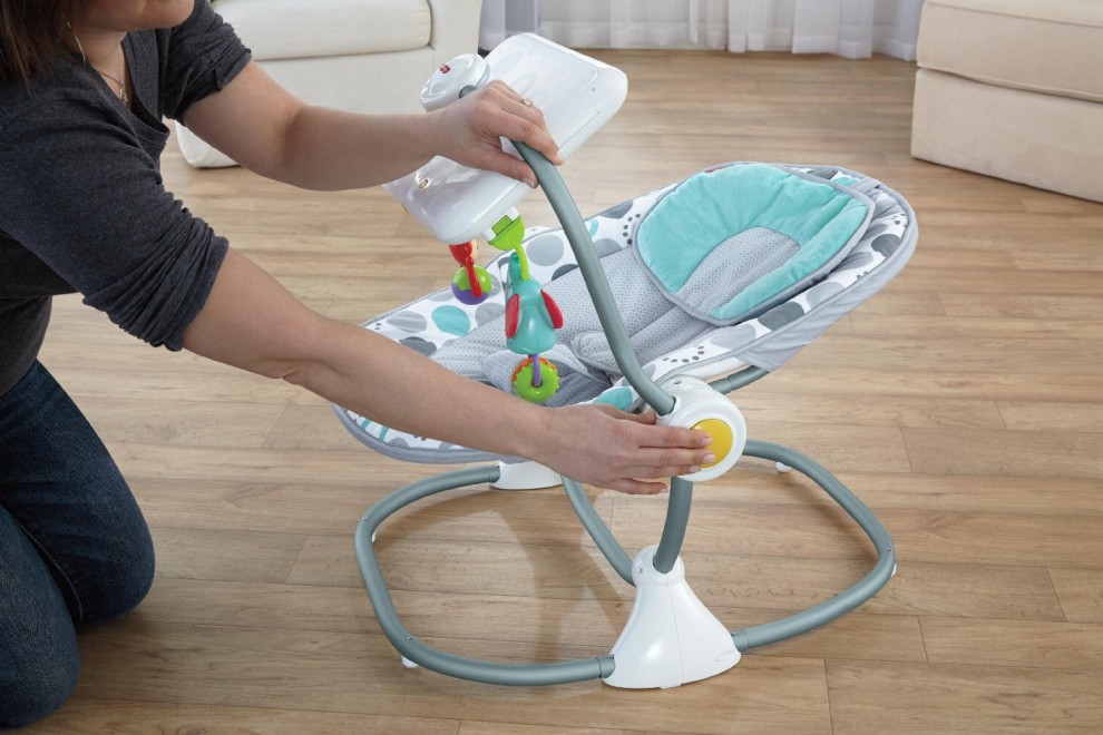 La poltrona per neonati con il porta iPad