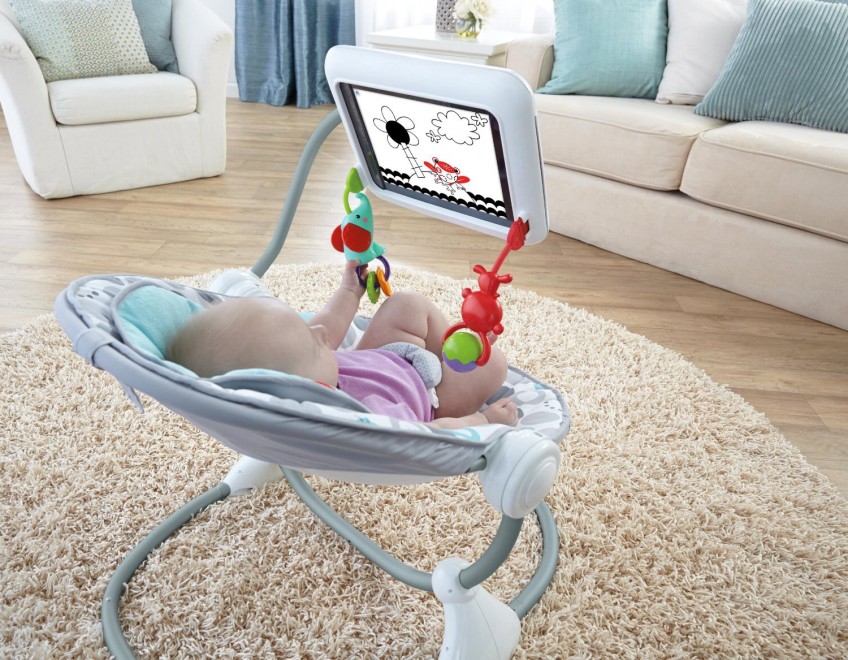 La poltrona per neonati con il porta iPad