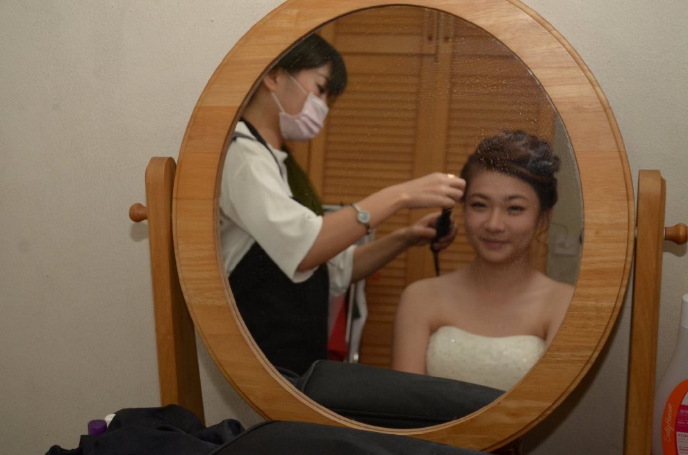 Singapore: scatti sono orrendi, fotografo si scusa. E il matrimonio diventa virale