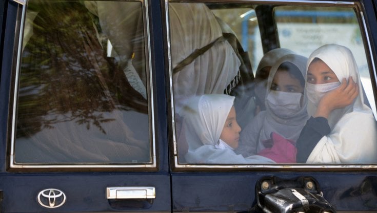 School girls travel on a vehicle in Kandahar, Afghanistan 