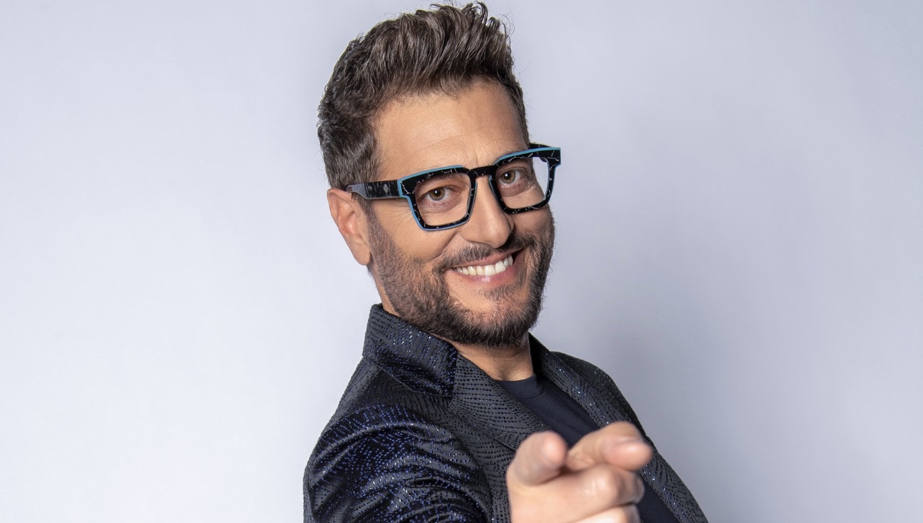 Enrico Papi torna in tv: 