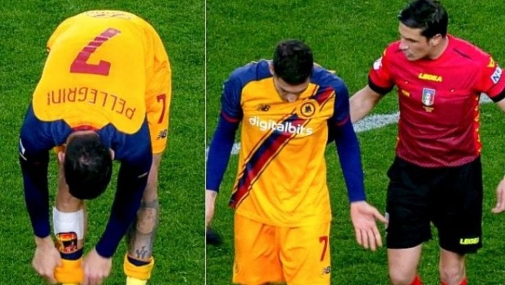Lorenzo Pellegrini esce lentamente dal terreno di gioco di Marassi