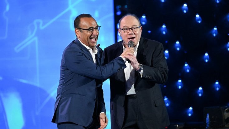 The Band batte l'Isola dei famosi: Carlo Conti vince la sfida del venerdì sera
