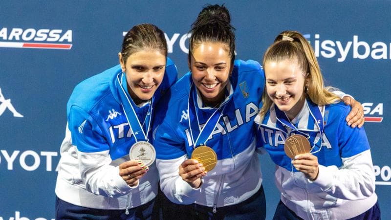Il podio del fioretto: Errigo (argento), Volpi (oro), Favaretto (bronzo)
