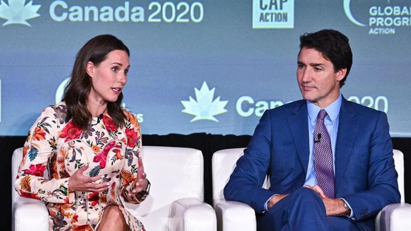 L'ex premier finlandese Sanna Marin e il primo ministro canadese Justin Trudeau
