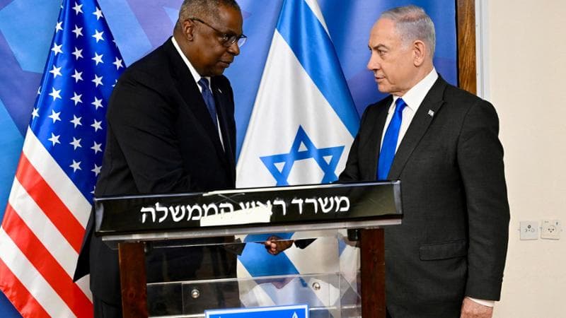 epa11035913 A handout photo made available by the US Embassy in Israel shows US Secretary of Defense Lloyd Austin (L) meets Israeli Prime Minister Benjamin Netanyahu (R), at the Kirya military base in Tel Aviv, Israel, 18 December 2023.  EPA/DAVID AZAGURY / US EMBASSY IN ISRAEL / HANDOUT  HANDOUT EDITORIAL USE ONLY/NO SALES HANDOUT EDITORIAL USE ONLY/NO SALES