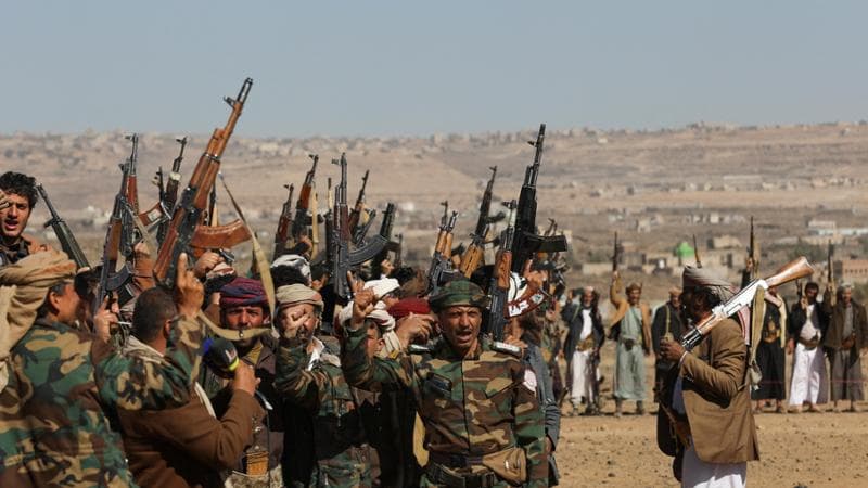 Houthi fighters and tribal supporters hold up their firearms during a protest against recent U.S.-led strikes on Houthi targets, near Sanaa, Yemen January 14, 2024. REUTERS/Khaled Abdullah