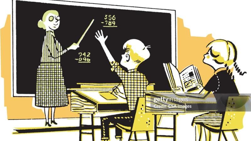 Classroom with Two Children Doing Arithmetic
