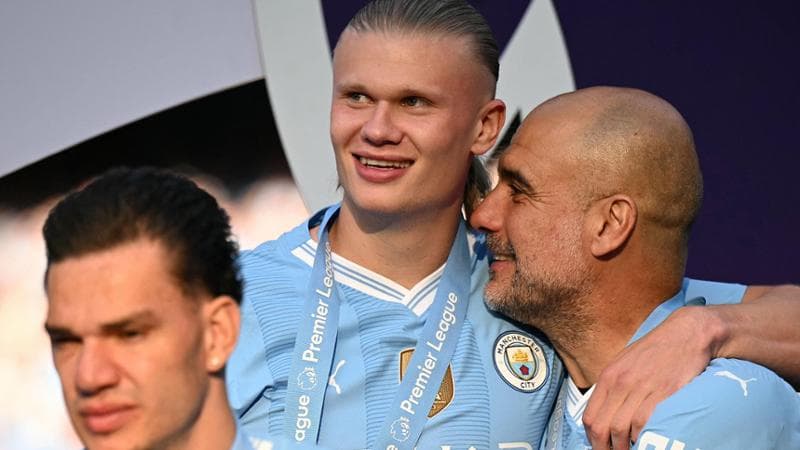 Erling Haaland e Pep Guardiola