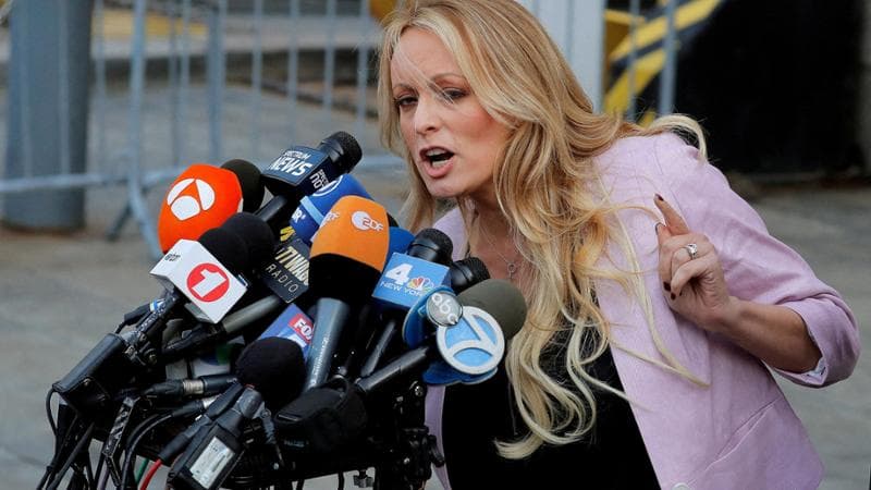 FILE PHOTO: Adult-film actress Stephanie Clifford, also known as Stormy Daniels, speaks as she departs federal court in the Manhattan borough of New York City, New York, U.S., April 16, 2018. REUTERS, Lucas Jackson/File Photo