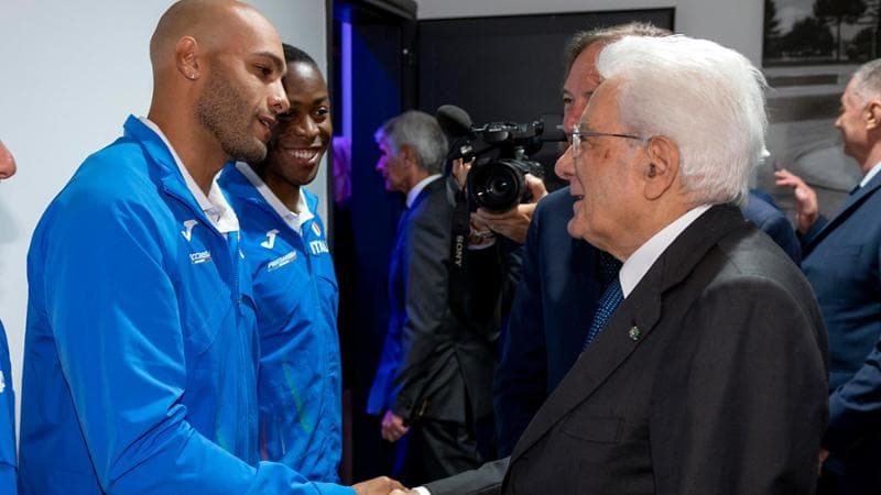 Il presidente Sergio Mattarella con Marcell Jacobs e Fausto Desalu
