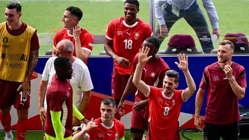 I giocatori della Svizzera festeggiano la vittoria contro l'Italia