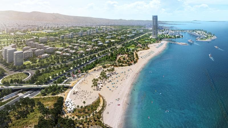 un rendering panoramico dell’Ellinikon, con la spiaggia, e, sullo sfondo, la Riviera Tower, primo grattacielo (verde) greco