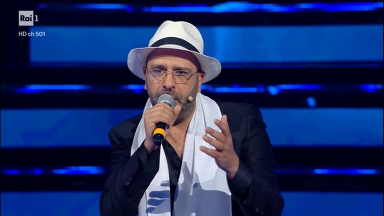 Sanremo 2022, la canzone del virologo Checco Zalone-cugino di Al Bano: "Pandemia ora che vai via"