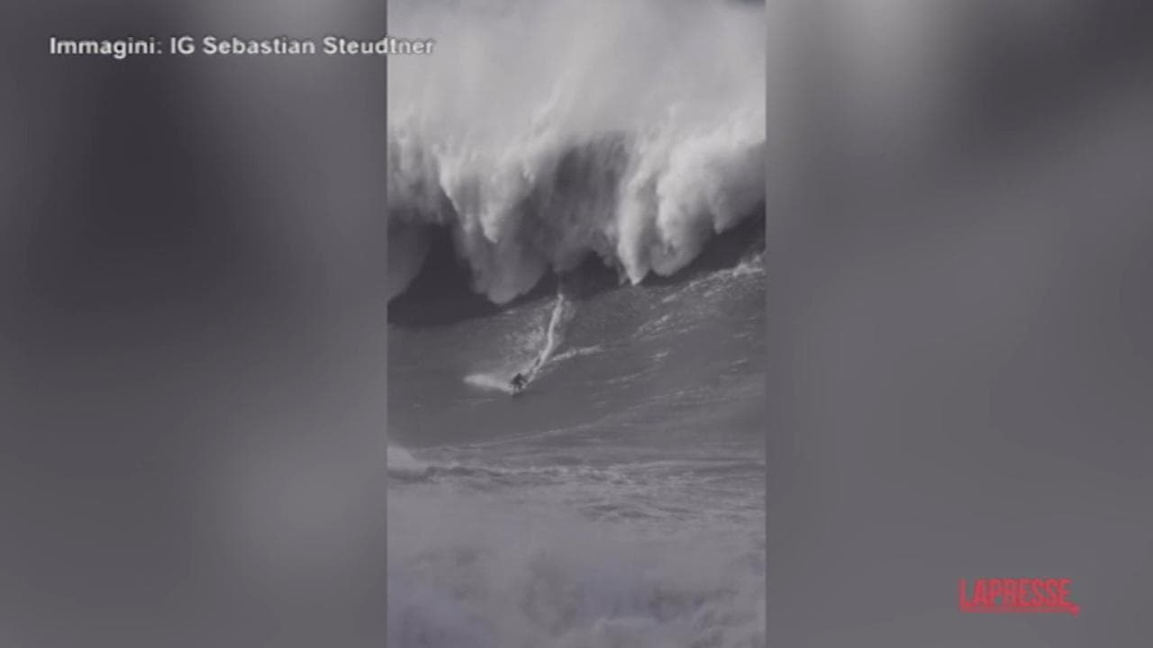 Portogallo, un muro d'acqua alto 28 metri: Sebastian Steudtner cavalca l'onda più alta di sempre