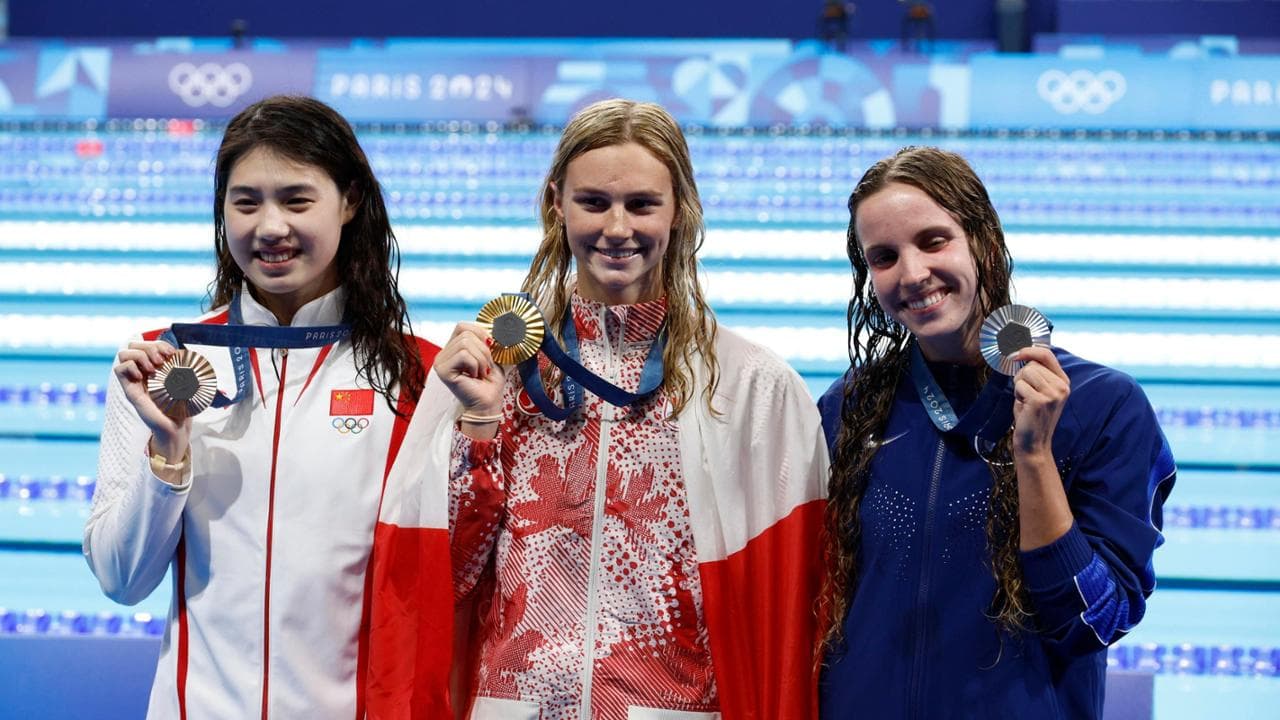 Il podio olimpico dei 200 farfalla