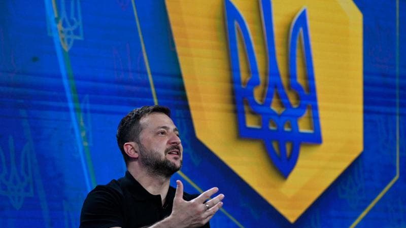 Ukraine's President Volodymyr Zelensky gestures as he speaks during a joint press conference in Kyiv, on August 27, 2024, amid the Russian invasion of Ukraine. (Photo by Sergei CHUZAVKOV / AFP)