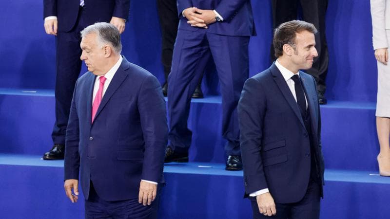 Orban e Macron&nbsp;(Photo by Ludovic MARIN / AFP)

