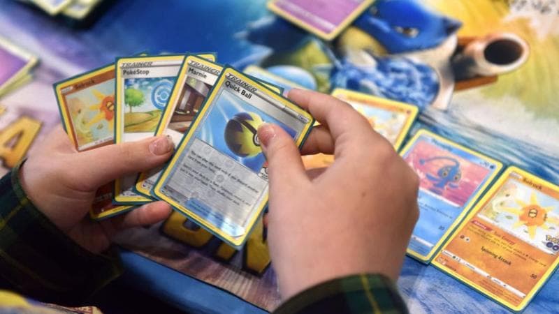 Un torneo di carte Pokémon (foto Getty)