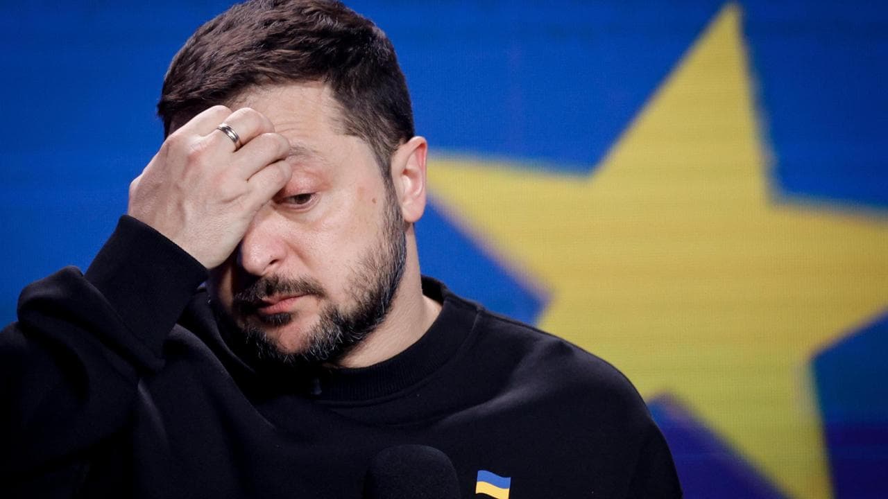 epa11037495 Ukrainian President Volodymyr Zelensky reacts during a press conference in Kyiv (Kiev), Ukraine, 19 December 2023. Zelensky spoke with the media during his year-end press conference amid the Russian invasion.  EPA/SERGEY DOLZHENKO