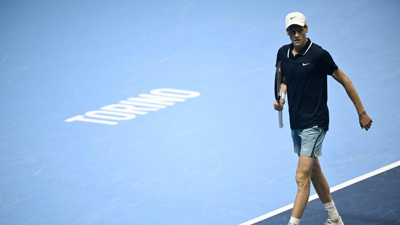 Italy's Jannik Sinner looks on during his semi-final match against Norway's Casper Ruud at the ATP Finals tennis tournament in Turin on November 16, 2024. (Photo by Marco BERTORELLO / AFP)