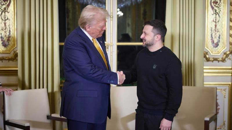 epa11763045 A handout picture made available by the Presidential Press Service of Ukraine shows US President-elect Donald Trump (L), and Ukrainian President Volodymyr Zelensky (R) shaking hands during their meeting with French President Emmanuel Macron (not pictured) at the Elysee Palace, as part of ceremonies marking the reopening of the Notre Dame de Paris Cathedral, in Paris, France, 07 December 2024. The Notre Dame de Paris Cathedral reopens on 07 December after nearly six years of renovation work following its destruction by a fire on 15 April 2019.  EPA/Presidential Press Service of Ukraine HANDOUT  HANDOUT EDITORIAL USE ONLY/NO SALES