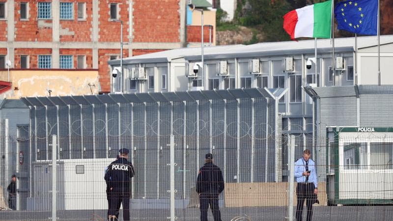FILE PHOTO: A general view of the reception camp, as migrants who were intercepted at sea and later detained at a reception facility in Albania are transferred to Italy after a court in Rome overturned their detention orders, in Shengjin, Albania, October 19, 2024. REUTERS/Florion Goga/File Photo