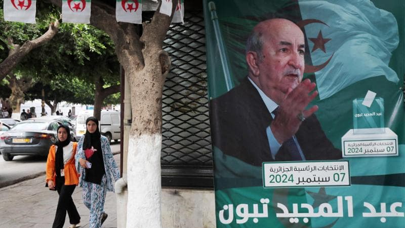 Un manifesto con il volto di&nbsp;Abdelmadjid Tebboune
