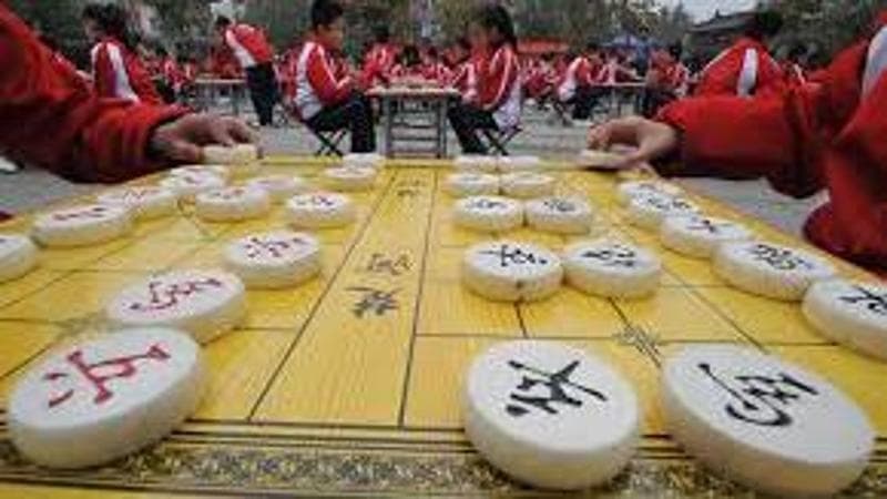 Scandalo nel mondo degli scacchi cinesi: tre campioni di Xiangqi accusati di corruzione
