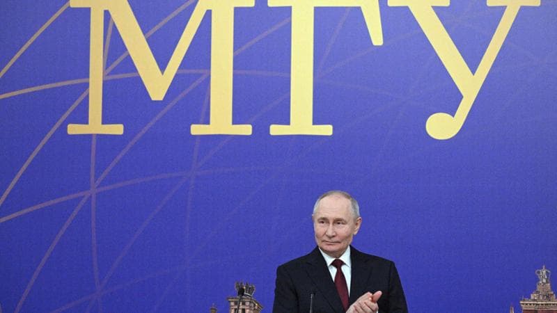 In this pool photograph distributed by the Russian state agency Sputnik, Russia's President Vladimir Putin visits the Moscow State University (MSU) in Moscow on January 24, 2025. (Photo by Ramil SITDIKOV / POOL / AFP)