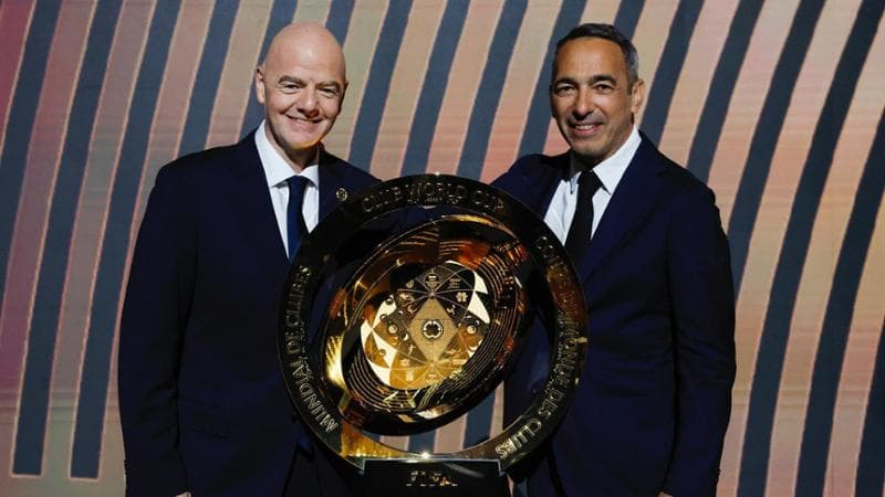 Djorkaeff con Infantino
