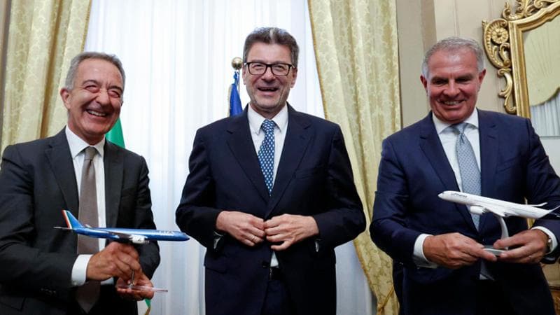(L-R) President of Ita Airways Antonino.Turicchi, Italian Economy Minister Giancarlo Giorgetti and Lufthansa CEO Carsten Spohr during a press conference presenting the agreement between Ita Airways and Lufthansa, Rome 3 July 2024. ANSA/FABIO FRUSTACI