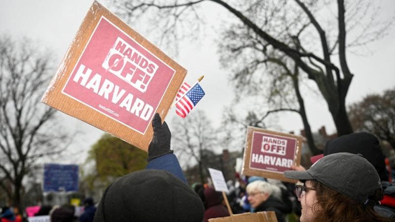 FILE PHOTO: Demonstrators rally on Cambridge Common in a protest organized by the City of Cambridge calling on Harvard leadership to resist interference at the university by the federal government in Cambridge, Massachusetts, U.S. April 12, 2025.   REUTERS/Nicholas Pfosi/File Photo