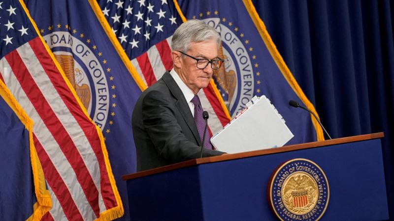 FILE PHOTO: U.S. Federal Reserve Chair Jerome Powell attends a press conference, following a two-day meeting of the Federal Open Market Committee on interest rate policy, in Washington, D.C., U.S., March 19, 2025. REUTERS/Nathan Howard/File Photo