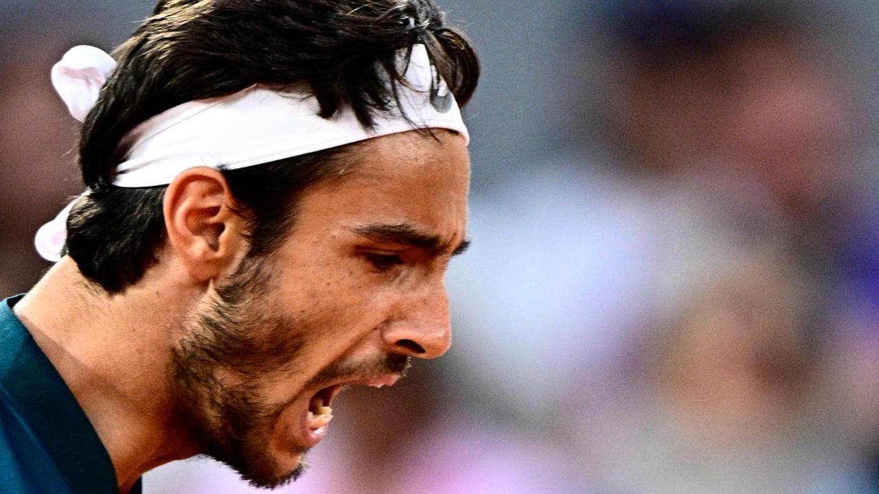 L'urlo di Lorenzo Musetti dopo il game vinto