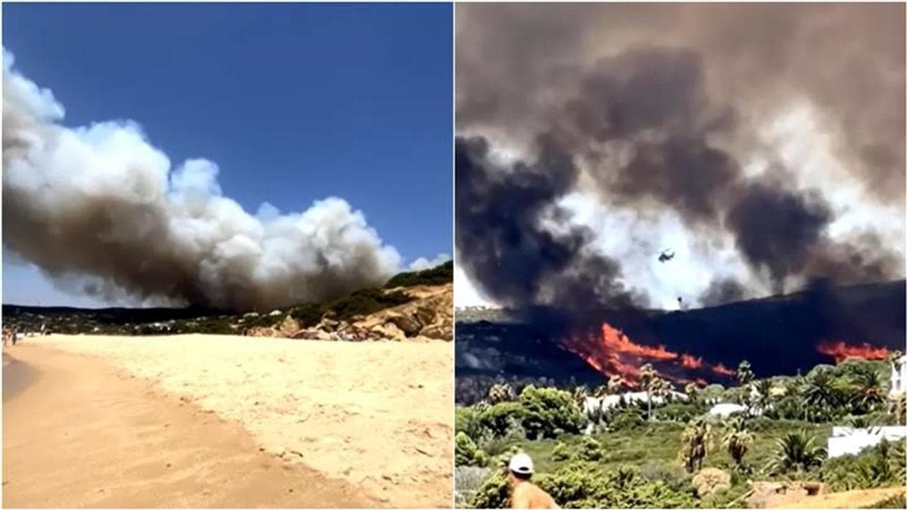 Andalusia in fiamme, cielo nero su Tarifa e sulla costa di Cadice: migliaia in fuga dalle spiagge