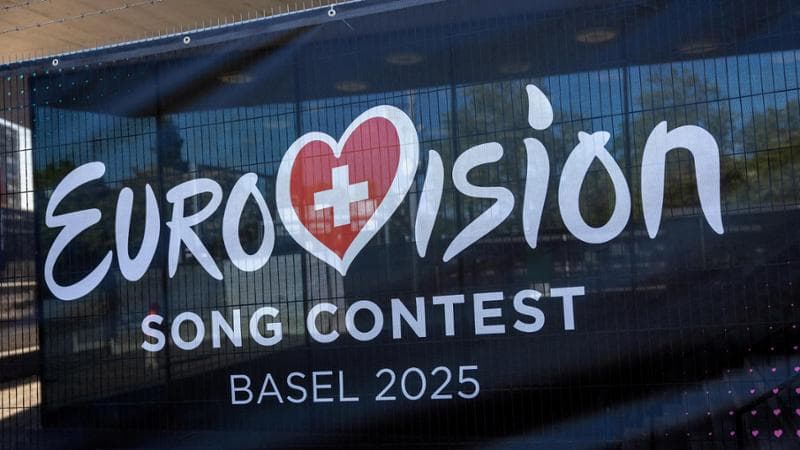 FILE PHOTO: A logo of the Eurovision Song Contest is seen in front of the St. Jakobshalle in Basel, Switzerland, May 1, 2025. REUTERS/Denis Balibouse/File Photo