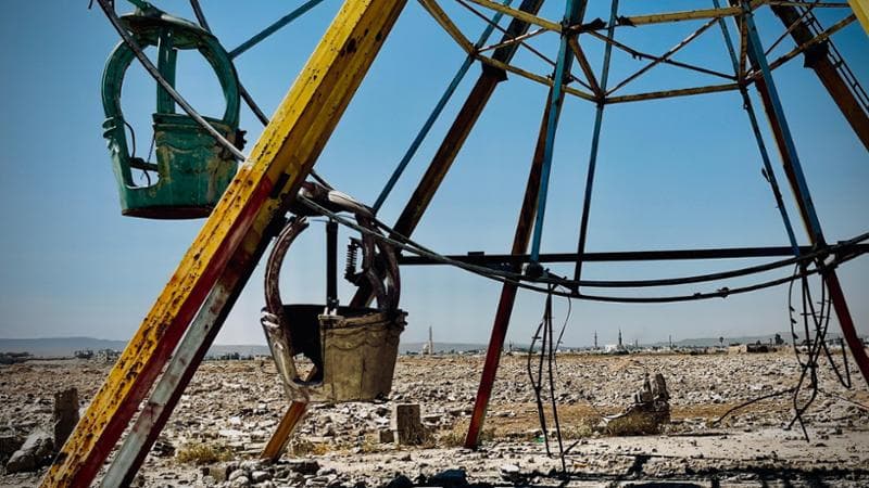 Il parco giochi alla periferia di Yarmouk. Nata come campo profughi, era diventata la terza “città” per reddito della Siria (Francesca Borri)