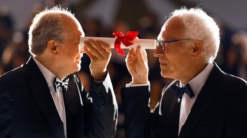 The 75th Cannes Film Festival - Photocall after Closing ceremony - Cannes, France, May 28, 2022. Directors Jean-Pierre Dardenne and Luc Dardenne, 75th Anniversary Prize winners for the film "Tori et Lokita" (Tori and Lokita), pose. REUTERS/Stephane Mahe