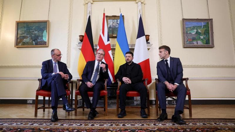 (L to R) Germany's Chancellor Friedrich Merz, Britain's Prime Minister Keir Starmer, Ukraine's President Volodymyr Zelensky and French President Emmanuel Macron take part in meetings at Number 10 Downing Street in central London on December 8, 2025. (Photo by Toby Melville / POOL / AFP)