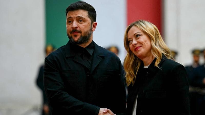 Italy's Prime Minister, Giorgia Meloni welcomes Ukraine's President Volodymyr Zelensky at Palazzo Chigi prior their meeting in Rome on December 9, 2025. (Photo by Filippo MONTEFORTE / AFP)