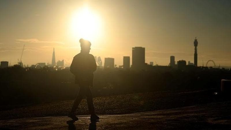 Sunrise over (EPA/NEIL HALL)