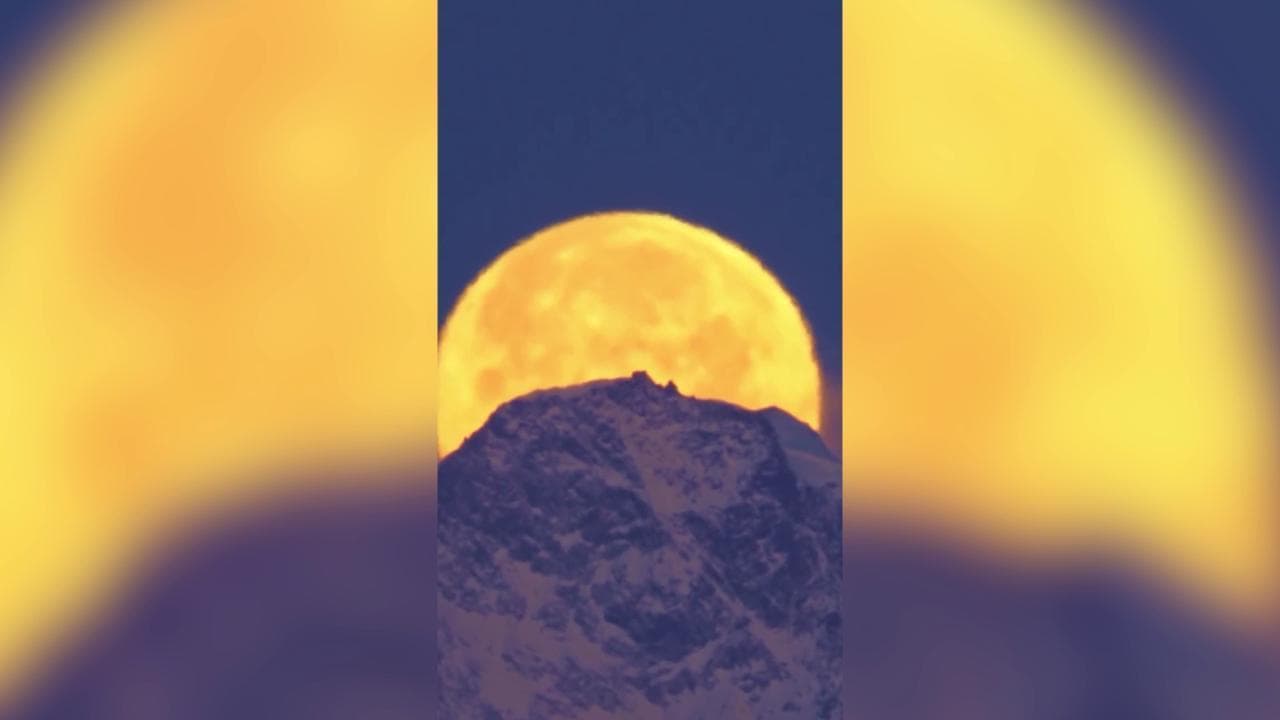 Monte Rosa, la superluna "si nasconde" dietro il rifugio più alto d'Europa: le immagini mozzafiato