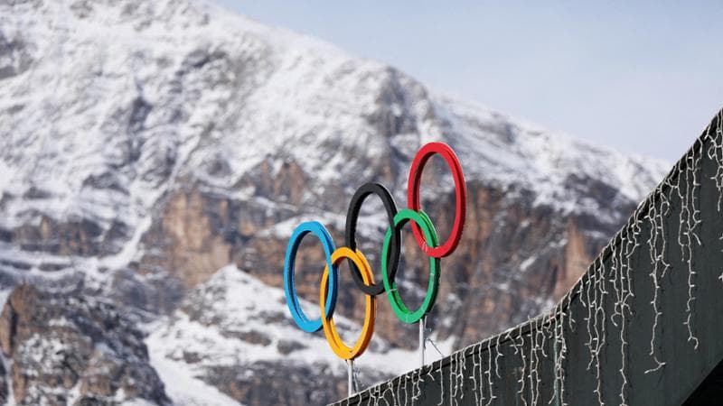 FILE PHOTO: A general view shows the Olympic rings on the Cortina Curling Olympic Stadium, which will host the curling, wheelchair curling, and Paralympic closing ceremony during the Milano Cortina Winter Olympic Games 2026, in Cortina, Italy, January 25, 2025. REUTERS/Claudia Greco/File Photo/File Photo