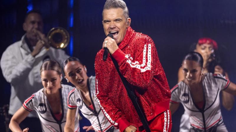 Robbie Williams chiama una fan dei Take That degli anni Novanta ma il numero non è più attivo